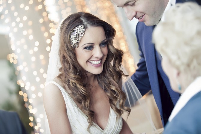 wedding bridal heapiece hair down in curls bride. real wedding by claire durking photography jenny packham style vintage bride