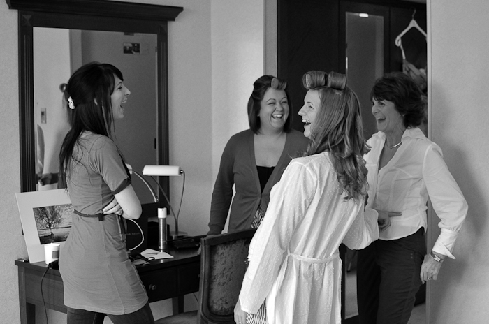 bride and bridesmaids getting ready