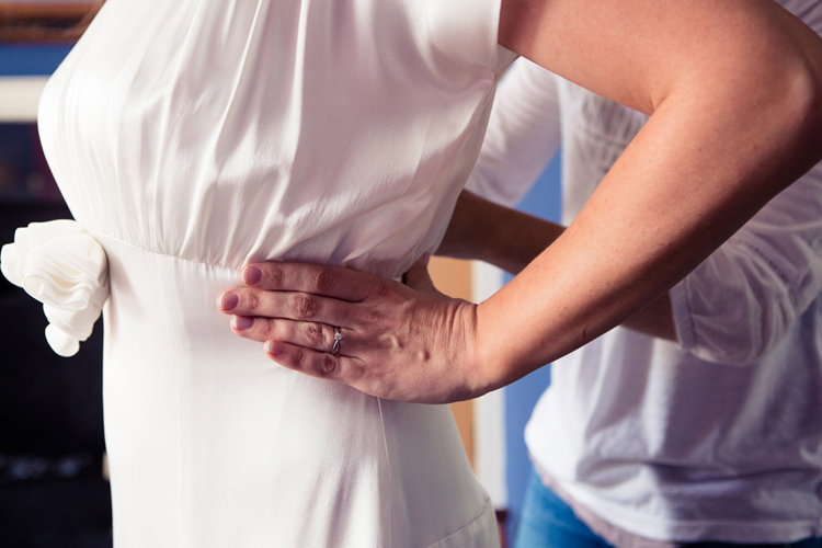 bride getting dressed