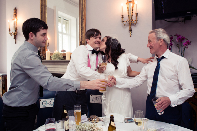 groom and father of the bride hand shake clique photography