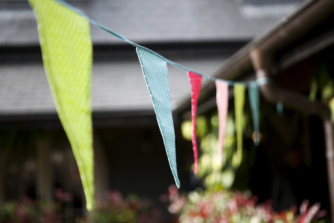 bunting wedding decor whimsical weddingsonline.ie colourful bunting outdoor wedding ireland