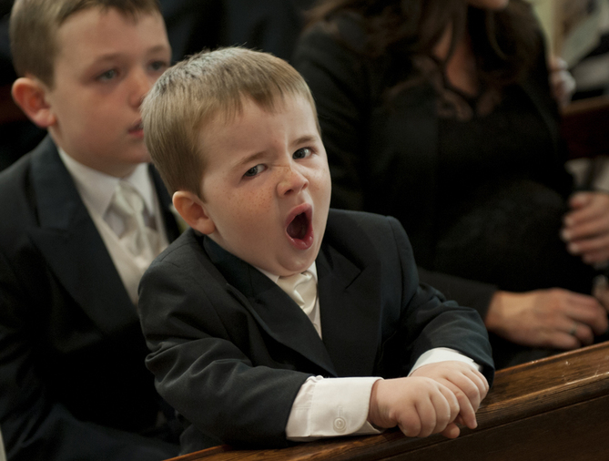 wedding page boy yawning