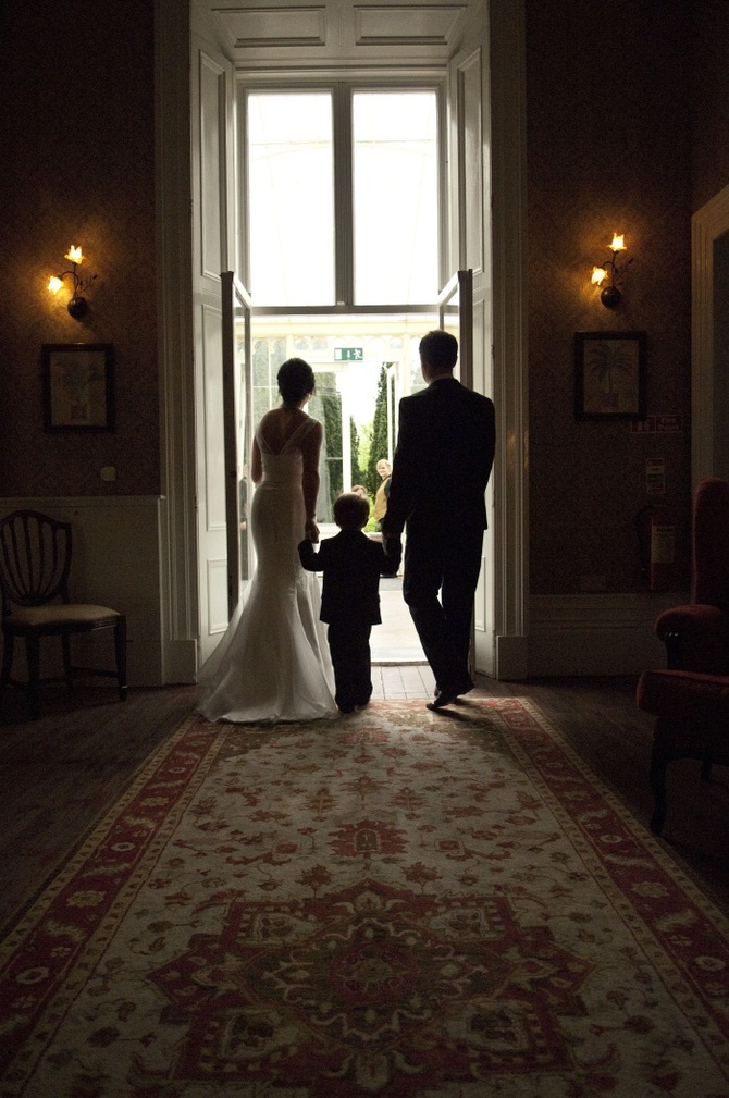 wedding couple and child
