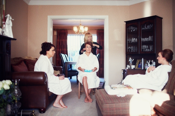 bridesmaids and bride getting ready hotel